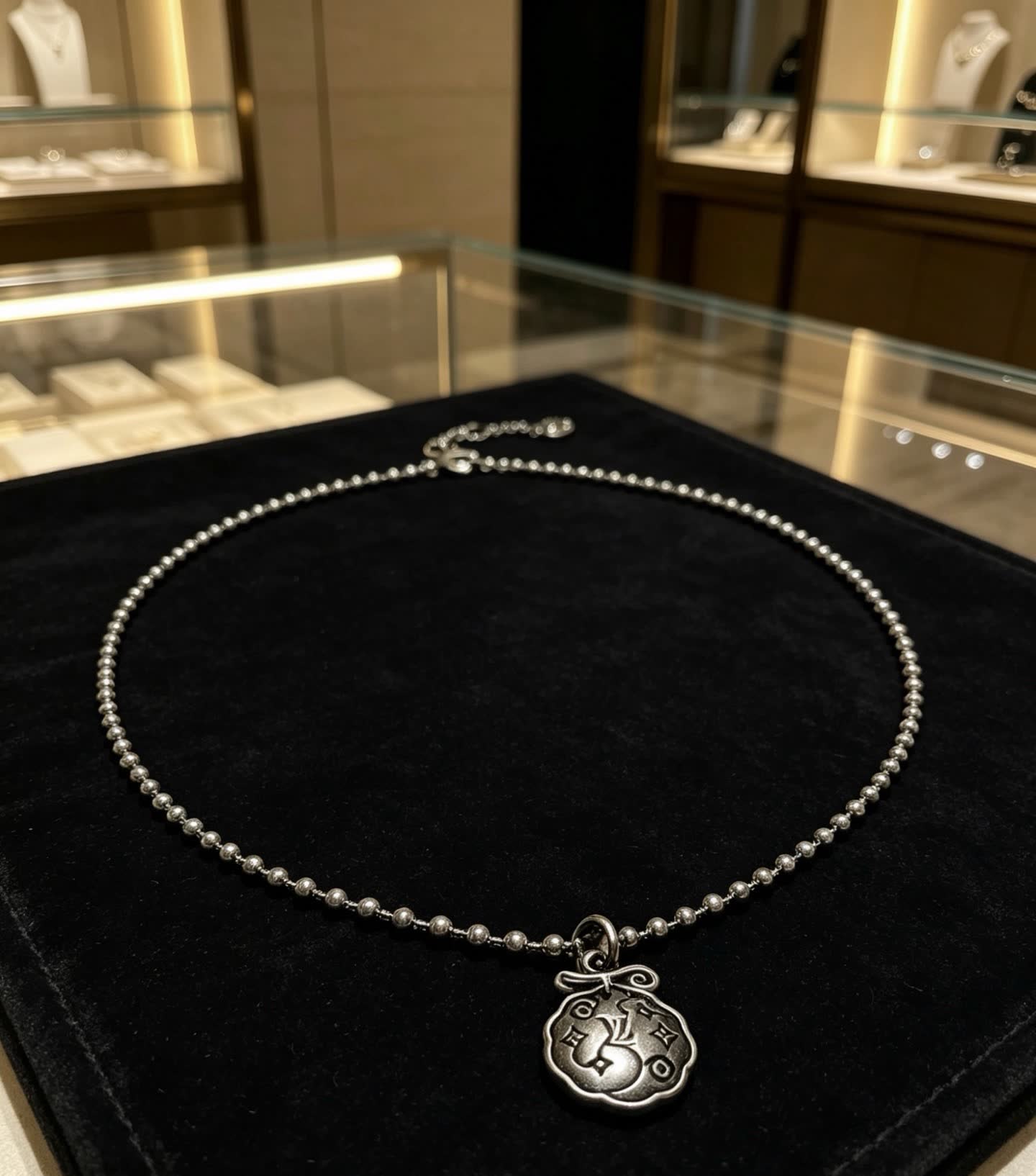 Louis Vuitton Silver Beaded Necklace with Round Pendant